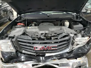 2009 GMC Sierra 2500HD SLT z VIN 1GTHK63K39F168755, wystawiony jako Copart lot #57220765 z przebiegiem 220 375 mil mil oraz Szkoda całkowita • Salvage title. Historia ofert i sprzedaży dostępna na DreamBid. Obrazek 11.