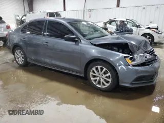 2015 Volkswagen Jetta SE with VIN 3VWD07AJ6FM343142, listed as a Copart auction lot 62472655 with 117,349 mi miles and Salvage title. Bid and sale history available at DreamBid. Image 4.