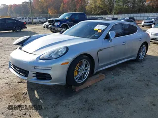 2015 Porsche Panamera 4S z VIN WP0AB2A70FL050779, wystawiony jako IAAI lot #40977292 z przebiegiem 78 574 mil mil oraz . Historia ofert i sprzedaży dostępna na DreamBid. Obrazek 2.
