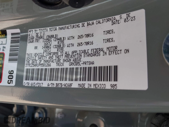 2023 Toyota Tacoma SR with VIN 3TMCZ5AN1PM581266, listed as a IAAI auction lot 42371395 with 32,582 mi miles and . Bid and sale history available at DreamBid. Image 9.