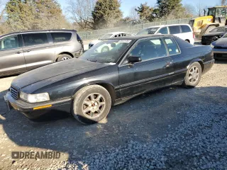 2001 Cadillac Eldorado Touring ETC z VIN 1G6ET12951B102160, wystawiony jako Copart lot #85475784 z przebiegiem 100 181 mil mil oraz Czysty tytuł • Clean title. Historia ofert i sprzedaży dostępna na DreamBid. Obrazek 1.
