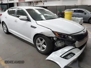 2015 Kia Optima LX with VIN KNAGM4A70F5644029, listed as a IAAI auction lot 42527633 with 140,546 mi miles and . Bid and sale history available at DreamBid. Image 1.