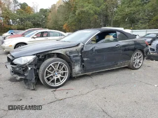 2014 BMW 6 Series 650i with VIN WBAYP9C53ED168965, listed as a Copart auction lot 79057634 with 112,868 mi miles and Salvage Title. Bid and sale history available at carsss.com. Image 1.
