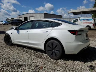 2024 Tesla Model 3 z VIN 5YJ3E1EA6RF734033, wystawiony jako Copart lot #52305665 z przebiegiem 21 081 mil mil oraz Szkoda całkowita • Salvage title. Historia ofert i sprzedaży dostępna na DreamBid. Obrazek 2.