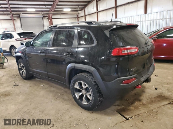 2018 Jeep Cherokee Trailhawk Leather Plus with VIN 1C4PJMBX4JD558201, listed as a Copart auction lot 53462775 with 94,604 mi miles and Salvage title. Bid and sale history available at DreamBid. Image 2.
