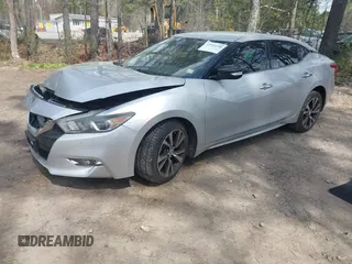 2016 Nissan Maxima SL with VIN 1N4AA6AP9GC406406, listed as a IAAI auction lot 41954790 with 139,380 mi miles and . Bid and sale history available at DreamBid. Image 2.