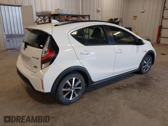 2018 Toyota Prius One with VIN JTDKDTB35J1599642, listed as a IAAI auction lot 42031112 with 58,801 mi miles and . Bid and sale history available at DreamBid. Image 4.