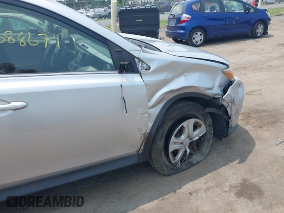2015 Toyota RAV4 LE with VIN JTMBFREV6FJ039453, listed as a IAAI auction lot 42388671 with 200,304 mi miles and . Bid and sale history available at DreamBid. Image 6.
