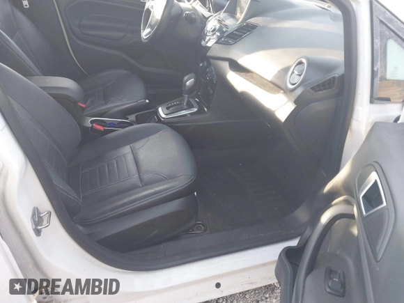 2017 Ford Fiesta Titanium with VIN 3FADP4FJ8HM112435, listed as a IAAI auction lot 41005143 with 75,144 mi miles and . Bid and sale history available at DreamBid. Image 5.