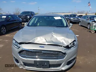 2016 Ford Fusion Titanium Hybrid with VIN 3FA6P0RU5GR171287, listed as a IAAI auction lot 41918195 with 74,721 mi miles. Bid and sale history available at carsss.com. Image 6.