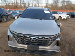 2022 Hyundai Tucson SEL with VIN 5NMJFCAE4NH060031, listed as a IAAI auction lot 41451874 with 57,228 mi miles and . Bid and sale history available at carsss.com. Image 18.