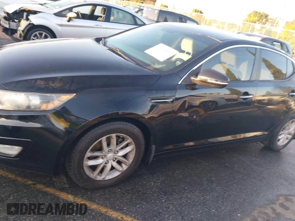 2013 Kia Optima LX z VIN 5XXGM4A75DG239179, wystawiony jako IAAI lot #41831088 z przebiegiem 128 411 mil mil oraz . Historia ofert i sprzedaży dostępna na DreamBid. Obrazek 14.