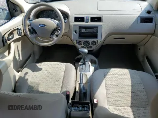2006 Ford Focus S z VIN 1FAFP34N96W111431, wystawiony jako Copart lot #59478815 z przebiegiem Nie podano mil oraz Szkoda całkowita • Salvage title. Historia ofert i sprzedaży dostępna na DreamBid. Obrazek 8.