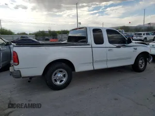 2002 Ford F-150 XL z VIN 1FTRX17W22NB22531, wystawiony jako Copart lot #54694475 z przebiegiem Nie podano mil oraz Szkoda całkowita • Salvage title. Historia ofert i sprzedaży dostępna na DreamBid. Obrazek 3.