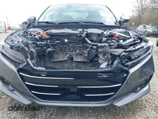 2021 Honda Accord Touring with VIN 1HGCV3F90MA001513, listed as a IAAI auction lot 41939003 with 107,246 mi miles and . Bid and sale history available at DreamBid. Image 6.