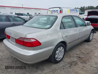 1999 Honda Accord LX z VIN 1HGCG5646XA147476, wystawiony jako IAAI lot #41752857 z przebiegiem 86 339 mil mil oraz . Historia ofert i sprzedaży dostępna na DreamBid. Obrazek 4.