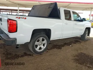 2015 Chevrolet Silverado 1500 LT with VIN 1GCVKREC1FZ415386, listed as a IAAI auction lot 42142990 with 165,409 mi miles and . Bid and sale history available at DreamBid. Image 4.
