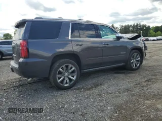 2015 Chevrolet Tahoe LTZ with VIN 1GNSKCKC9FR698924, listed as a Copart auction lot 56196895 with 184,740 mi miles and Salvage title. Bid and sale history available at DreamBid. Image 3.