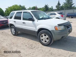 2003 Ford Escape XLT Popular 2 with VIN 1FMYU931X3KC36742, listed as a IAAI auction lot 42503698 with 95,840 mi miles and . Bid and sale history available at DreamBid. Image 1.
