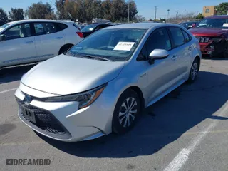 2020 Toyota Corolla Hybrid LE with VIN JTDEBRBE0LJ027338, listed as a IAAI auction lot 41721044 with 120,868 mi miles. Bid and sale history available at carsss.com. Image 2.