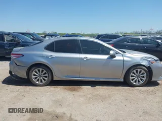 2019 Toyota Camry LE z VIN 4T1B11HK8KU789295, wystawiony jako IAAI lot #41993966 z przebiegiem 94 165 mil mil oraz . Historia ofert i sprzedaży dostępna na DreamBid. Obrazek 13.