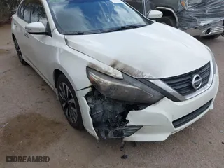 2018 Nissan Altima 2.5 SR with VIN 1N4AL3AP2JC140548, listed as a IAAI auction lot 41968993 with 112,000 mi miles. Bid and sale history available at carsss.com. Image 6.