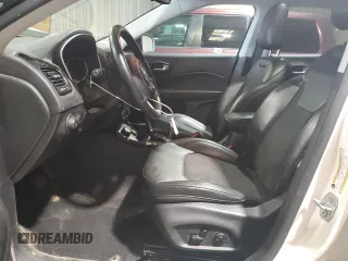2020 Jeep Compass Latitude with VIN 3C4NJDBB1LT157875, listed as a Copart auction lot 60310155 with 81,817 mi miles and Salvage title. Bid and sale history available at DreamBid. Image 7.