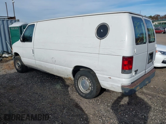 2002 Ford Econoline Cargo with VIN 1FTRE14262HB84357, listed as a IAAI auction lot 40880551 with 123,183 mi miles. Bid and sale history available at carsss.com. Image 3.