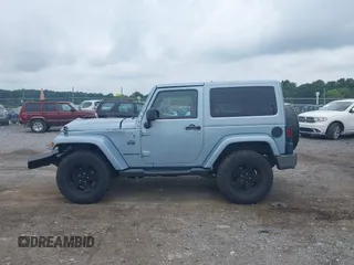 2012 Jeep Wrangler Arctic with VIN 1C4AJWBG7CL148325, listed as a IAAI auction lot 39943602 with 86,625 mi miles and . Bid and sale history available at DreamBid. Image 14.