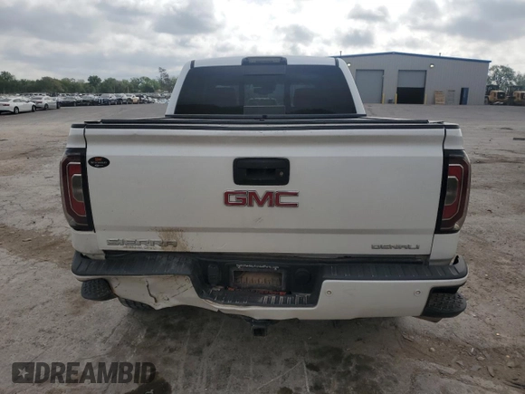 2017 GMC Sierra 1500 Denali with VIN 3GTU2PEJ6HG272209, listed as a Copart auction lot 53292975 with 106,499 mi miles and Salvage Title. Bid and sale history available at DreamBid. Image 6.