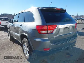 2011 Jeep Grand Cherokee Laredo with VIN 1J4RR4GG9BC714325, listed as a IAAI auction lot 41560915 with 153,372 mi miles and . Bid and sale history available at DreamBid. Image 3.