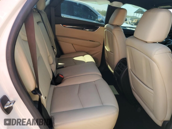 2017 Cadillac XT5 FWD z VIN 1GYKNARS3HZ297366, wystawiony jako Copart lot #53908815 z przebiegiem 95 834 mil mil oraz Szkoda całkowita • Salvage title. Historia ofert i sprzedaży dostępna na DreamBid. Obrazek 11.