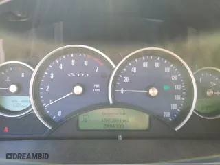 2004 Pontiac GTO with VIN 6G2VX12GX4L287389, listed as a Copart auction lot 57881874 with 107,291 mi miles and Salvage Title. Bid and sale history available at carsss.com. Image 9.