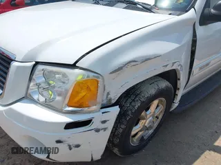 2004 GMC Envoy SLT with VIN 1GKET16S646135986, listed as a IAAI auction lot 42420464 with 132,741 mi miles and . Bid and sale history available at DreamBid. Image 6.