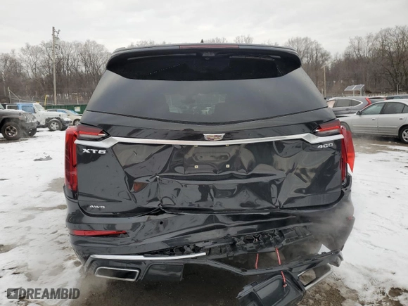 2020 Cadillac XT6 AWD Premium Luxury with VIN 1GYKPDRS7LZ124714, listed as a Copart auction lot 41449365 with 48,918 mi miles and Salvage Title. Bid and sale history available at carsss.com. Image 6.