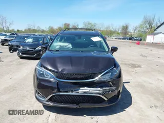 2017 Chrysler Pacifica Touring L with VIN 2C4RC1BG0HR747551, listed as a IAAI auction lot 42139664 with 120,057 mi miles and . Bid and sale history available at DreamBid. Image 11.
