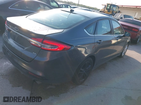 2018 Ford Fusion SE with VIN 3FA6P0HD4JR256663, listed as a IAAI auction lot 42814801 with 112,809 mi miles and . Bid and sale history available at DreamBid. Image 4.