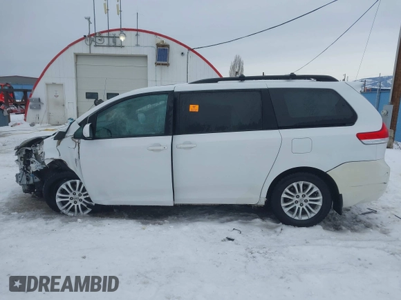 2014 Toyota Sienna XLE with VIN 5TDYK3DC9ES442525, listed as a IAAI auction lot 41502770 with Not provided miles and . Bid and sale history available at DreamBid. Image 14.