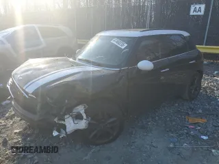 2014 MINI Countryman S with VIN WMWZC3C51EWP25860, listed as a Copart auction lot 47460235 with 128,314 mi miles and Salvage Title. Bid and sale history available at DreamBid. Image 1.