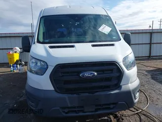 2020 Ford Transit Cargo with VIN 1FTBR1C8XLKB39681, listed as a IAAI auction lot 41304260 with 87,316 mi miles and . Bid and sale history available at DreamBid. Image 12.