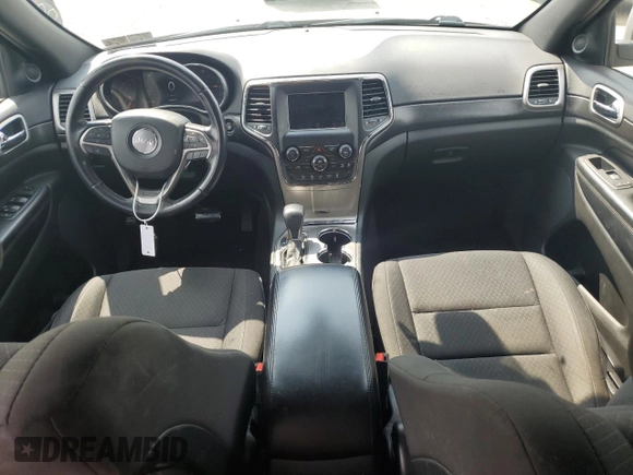 2018 Jeep Grand Cherokee Laredo E with VIN 1C4RJFAG0JC351090, listed as a Copart auction lot 52958635 with 96,956 mi miles and Salvage Title. Bid and sale history available at DreamBid. Image 8.