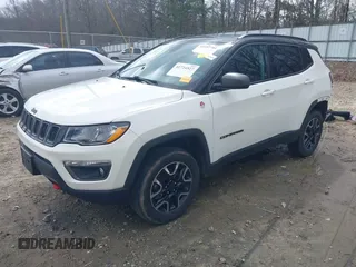 2019 Jeep Compass Trailhawk with VIN 3C4NJDDB0KT733175, listed as a IAAI auction lot 41724527 with 82,574 mi miles and . Bid and sale history available at carsss.com. Image 18.