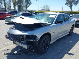 2020 Dodge Charger R/T with VIN 2C3CDXCTXLH107822, listed as a IAAI auction lot 41836583 with 14,573 mi miles and . Bid and sale history available at carsss.com. Image 2.