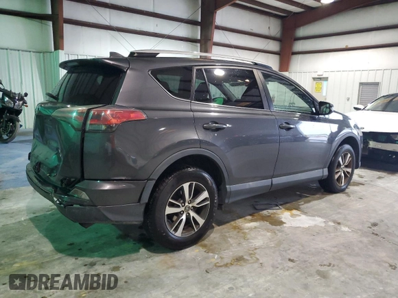2016 Toyota RAV4 XLE with VIN 2T3RFREV3GW423028, listed as a Copart auction lot 63466735 with 164,207 mi miles and Salvage title. Bid and sale history available at DreamBid. Image 3.