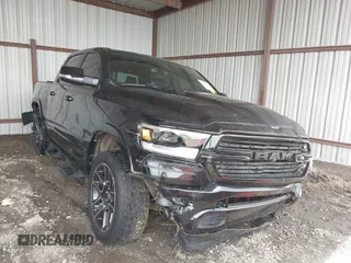2019 Ram 1500 Laramie z VIN 1C6SRFJTXKN612424, wystawiony jako IAAI lot #42093529 z przebiegiem 57 405 mil mil oraz . Historia ofert i sprzedaży dostępna na DreamBid. Obrazek 1.