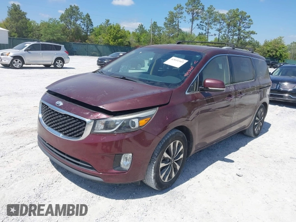 2015 Kia Sedona EX with VIN KNDMC5C19F6018139, listed as a IAAI auction lot 42031165 with 136,484 mi miles. Bid and sale history available at carsss.com. Image 2.