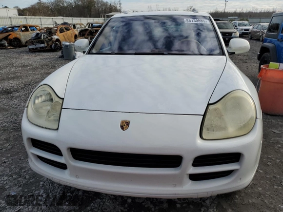 2005 Porsche Cayenne S with VIN WP1AB29P05LA63940, listed as a Copart auction lot 88130885 with 173,316 mi miles and Salvage Title. Bid and sale history available at carsss.com. Image 5.