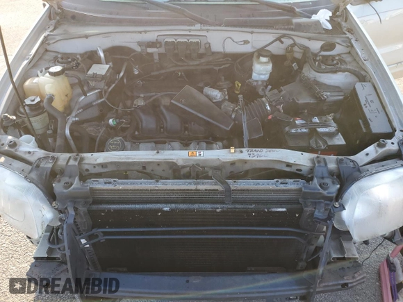 2005 Ford Escape Limited with VIN 1FMYU94195KB35872, listed as a Copart auction lot 63285755 with 145,638 mi miles and Salvage title. Bid and sale history available at DreamBid. Image 12.