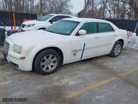 2006 Chrysler 300 Touring with VIN 2C3KA53G36H525834, listed as a IAAI auction lot 41274514 with 147,302 mi miles. Bid and sale history available at carsss.com. Image 2.
