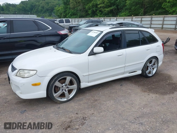 2002 Mazda Protege with VIN JM1BJ245021508764, listed as a IAAI auction lot 42198285 with 237,386 mi miles and . Bid and sale history available at DreamBid. Image 2.